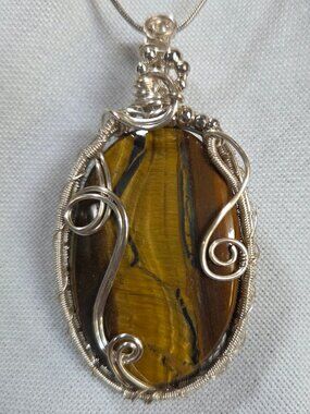 Wire Wrapped Tiger Eye Crystal Necklace. Handmade one of a kind silver filled